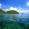 Snorkel spot against blue sky and sunbeam at Koh surin island ,Phang Nga, Thailand
