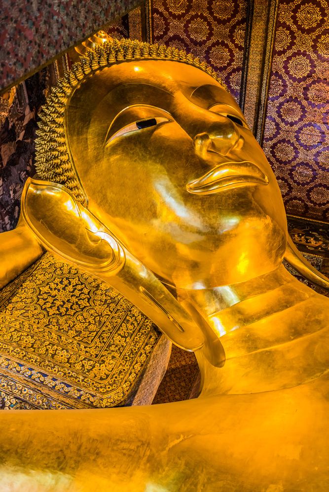 Bangkok reclining buddha portrait at Wat Pho temple Bangkok Thailand