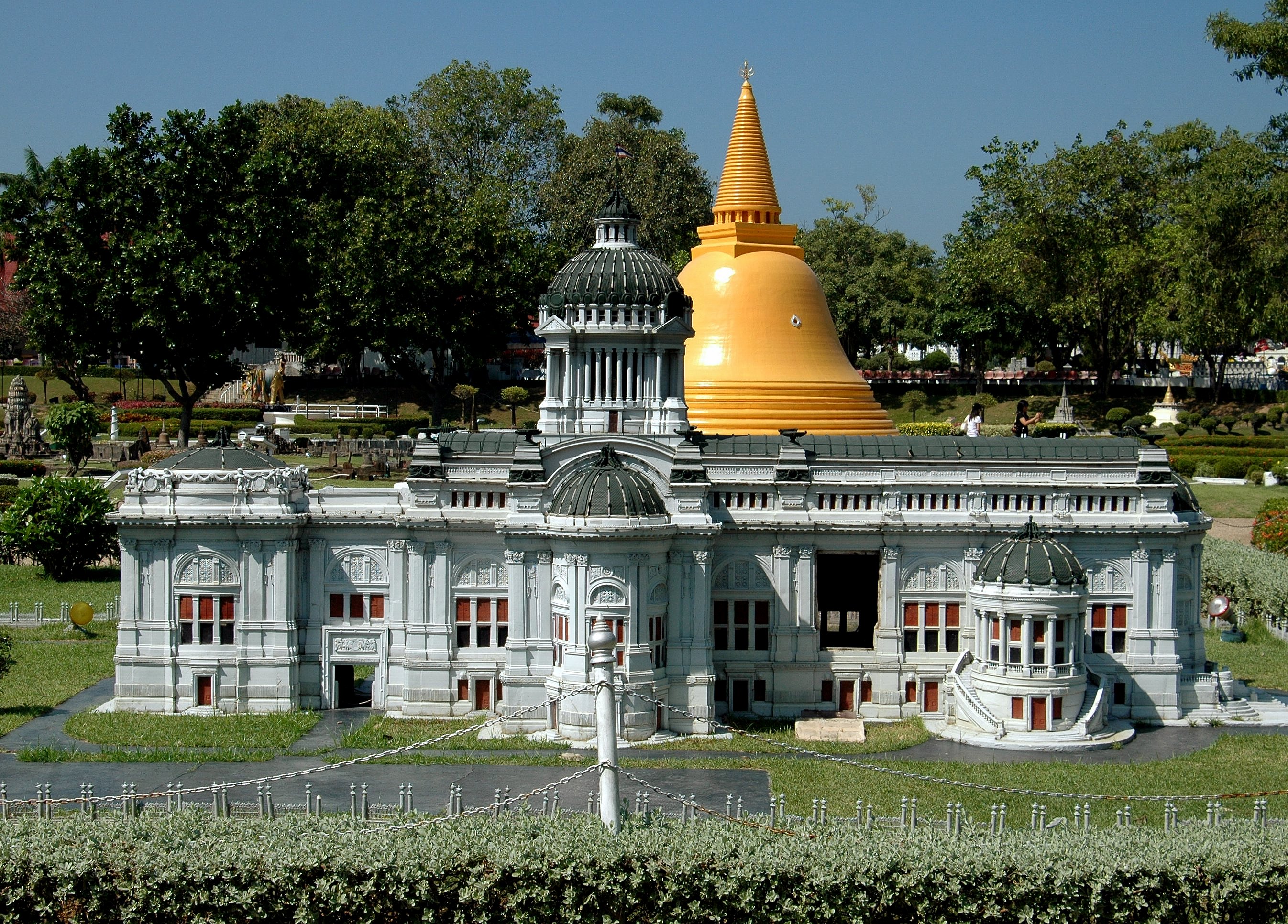 Pattaya, Thailand - December 30, 2005:  Bangkok's marble throne hall and the golden chedi at Nakhom Pathom in miniature at Mini Siam outdoor theme park